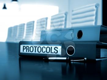 Protocols. Illustration on Blurred Background. Protocols - Office Binder on Black Table. Binder with Inscription Protocols on Wooden Table. 3D.