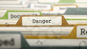 File Folder Labeled as Danger in Multicolor Archive. Closeup View. Blurred Image. 3D Render.