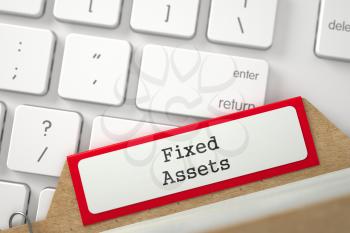 Fixed Assets written on Red Folder Register on Background of White PC Keypad. Close Up View. Selective Focus. 3D Rendering.