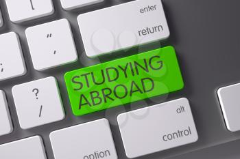 Studying Abroad Concept Modern Keyboard with Studying Abroad on Green Enter Key Background, Selected Focus. 3D.