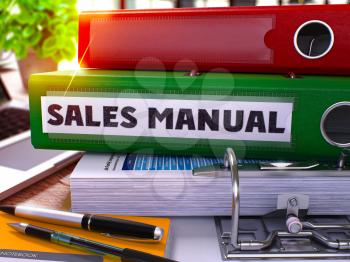 Sales Manual - Green Office Folder on Background of Working Table with Stationery and Laptop. Sales Manual Business Concept on Blurred Background. Sales Manual Toned Image. 3D.