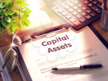 Capital Assets on Clipboard. Office Desk with a Lot of Office Supplies. 3d Rendering. Toned Image.