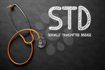 Medical Concept: Black Chalkboard with STD - Sexually Transmitted Disease. Medical Concept: STD - Sexually Transmitted Disease - Medical Concept on Black Chalkboard. 3D Rendering.