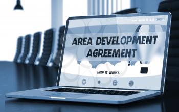 Area Development Agreement Concept. Closeup Landing Page on Laptop Display on Background of Conference Room in Modern Office. Toned Image. Blurred Background. 3D.