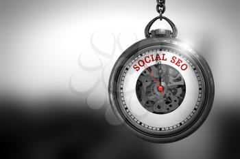 Business Concept: Social SEO on Pocket Watch Face with Close View of Watch Mechanism. Vintage Effect. Business Concept: Vintage Pocket Clock with Social SEO - Red Text on it Face. 3D Rendering.