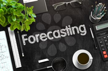 Forecasting - Black Chalkboard with Hand Drawn Text and Stationery. Top View. 3d Rendering. Toned Illustration.