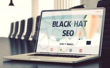 Closeup Black Hat SEO Concept on Landing Page of Laptop Screen in Modern Meeting Room. Toned Image. Selective Focus. 3D Illustration.