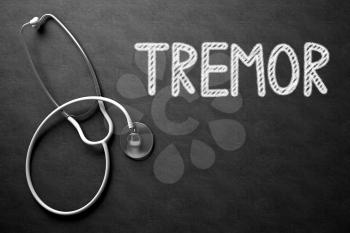 Medical Concept: Tremor Handwritten on Black Chalkboard. Top View of White Stethoscope on Chalkboard. Medical Concept: Tremor on Black Chalkboard. 3D Rendering.
