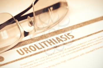 Urolithiasis - Medicine Concept with Blurred Text and Pair of Spectacles on Red Background. Selective Focus. 3D Rendering.