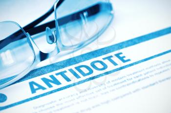 Antidote - Medicine Concept with Blurred Text and Pair of Spectacles on Blue Background. Selective Focus. 3D Rendering.