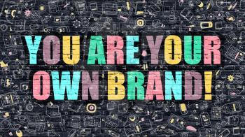 You are Your Own Brand Concept. Modern Illustration. Multicolor You are Your Own Brand Drawn on Dark Brick Wall. Doodle Icons. Doodle Style of You are Your Own Brand Concept.