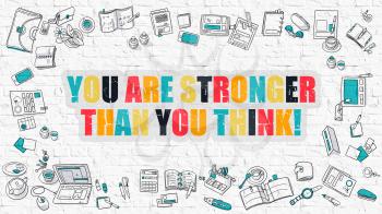 You are Stronger Than You Think - Multicolor Concept with Doodle Icons Around on White Brick Wall Background. Modern Illustration with Elements of Doodle Design Style.