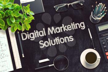 Digital Marketing Solutions Concept on Black Chalkboard. 3d Rendering. Toned Image.