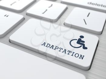 Adaptation Word with  Disabled Icon on Button of White Modern Computer Keyboard.