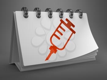 Red Syringe Icon on White Desktop Calendar Isolated on Gray Background. Medical Concept.