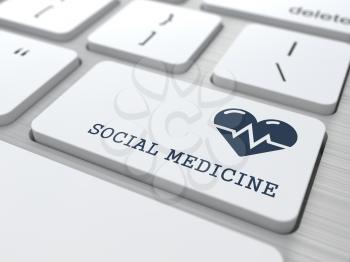 Social Medicine Words with Icon of Heart with Cardiogram Line on Button of White Modern Computer Keyboard.