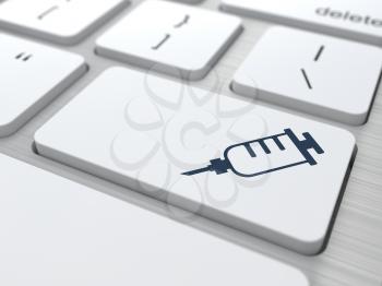 Button with Syringe Icon on White Modern Computer Keyboard. Medical Concept.