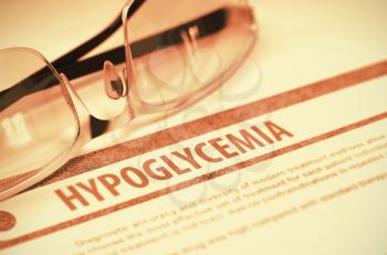 Hypoglycemia - Medicine Concept with Blurred Text and Specs on Red Background. Selective Focus. 3D Rendering.