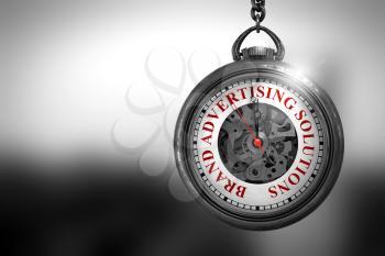 Brand Advertising Solutions Close Up of Red Text on the Vintage Pocket Watch Face. Business Concept: Vintage Pocket Clock with Brand Advertising Solutions - Red Text on it Face. 3D Rendering.