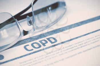 COPD - Chronic Obstructive Pulmonary Disease - Medicine Concept with Blurred Text and Spectacles on Blue Background. Selective Focus. 3D Rendering.