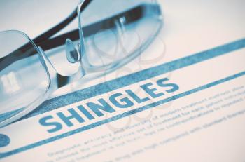 Shingles - Medicine Concept on Blue Background with Blurred Text and Composition of Glasses. Shingles - Medical Concept with Blurred Text and Specs on Blue Background. Selective Focus. 3D Rendering.