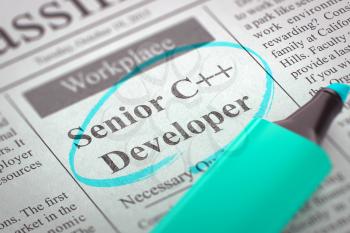 Newspaper with Classified Advertisement of Hiring Senior C Developer. Blurred Image. Selective focus. Hiring Concept. 3D.