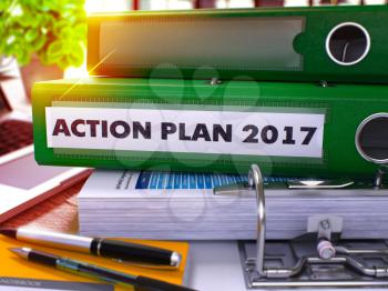 Green Office Folder with Inscription Action Plan 2017 on Office Desktop with Office Supplies and Modern Laptop. Action Plan 2017 Business Concept on Blurred Background. 3D Render.