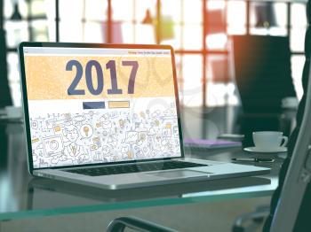 2017 - Closeup Landing Page in Doodle Design Style on Laptop Screen. On Background of Comfortable Working Place in Modern Office. Toned, Blurred Image. 3D Render. 