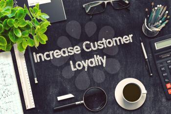 Increase Customer Loyalty on Black Chalkboard. 3d Rendering. Toned Image.