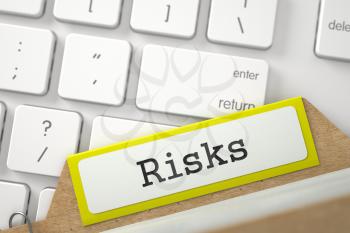 Risks written on Yellow Folder Register Concept on Background of White Modern Computer Keyboard. Close Up View. Selective Focus. 3D Rendering.