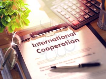 International Cooperation on Clipboard. Composition on Working Table and Office Supplies Around. 3d Rendering. Blurred Toned Illustration.