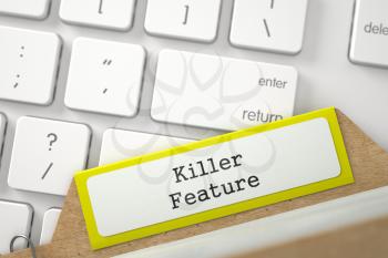 Killer Feature written on Yellow Folder Index Concept on Background of White Modern Computer Keypad. Closeup View. Blurred Illustration. 3D Rendering.