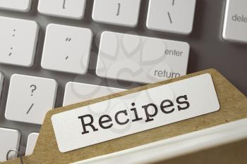 Recipes. Card Index Overlies Modern Laptop Keyboard. Archive Concept. Closeup View. Toned Blurred  Illustration. 3D Rendering.