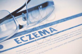 Eczema - Medicine Concept with Blurred Text and Specs on Blue Background. Selective Focus. 3D Rendering.