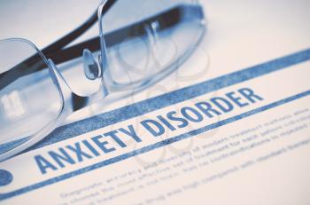 Anxiety Disorder - Printed Diagnosis with Blurred Text on Blue Background with Glasses. Medical Concept. 3D Rendering.