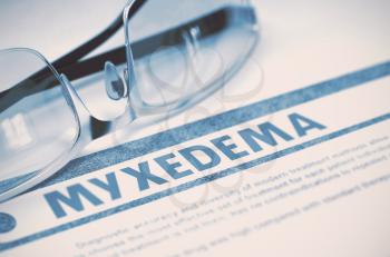 Myxedema - Printed Diagnosis with Blurred Text on Blue Background with Pair of Spectacles. Medical Concept. 3D Rendering.