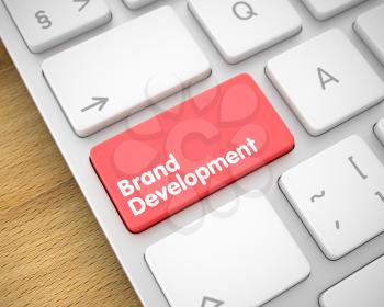Service Concept: Brand Development on the Laptop Keyboard lying on Wood Background. Service Concept with Modern Enter Red Keypad on the Keyboard: Brand Development. 3D Illustration.