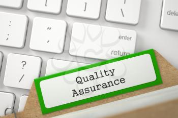 Quality Assurance. Green File Card on Background of Computer Keyboard. Business Concept. Closeup View. Blurred Image. 3D Rendering.