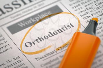 Orthodontist. Newspaper with the Vacancy, Circled with a Orange Marker. Blurred Image with Selective focus. Concept of Recruitment. 3D Render.