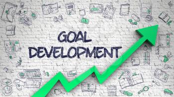 White Brickwall with Goal Development Inscription and Green Arrow. Business Concept. Goal Development Inscription on Modern Style Illustation. with Green Arrow and Doodle Design Icons Around. 