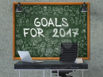 Goals for 2017 Concept Handwritten on Green Chalkboard with Doodle Icons. Office Interior with Modern Workplace. Gray Concrete Wall Background. 3D.