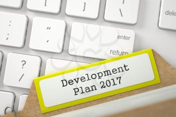 Development Plan 2017 Concept. Word on Yellow Folder Register of Card Index. Closeup View. Selective Focus. 3D Rendering.