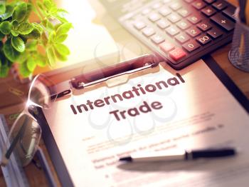 International Trade on Clipboard. Composition on Working Table and Office Supplies Around. 3d Rendering. Blurred and Toned Illustration.