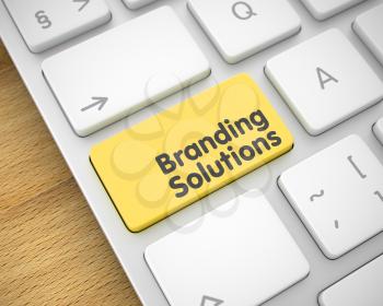 Service Concept: Branding Solutions on White Keyboard lying on Wood Background. Laptop Keyboard Button Showing the InscriptionBranding Solutions. Message on Keyboard Yellow Button. 3D Illustration.