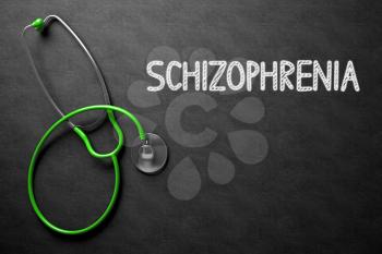 Schizophrenia. Medical Concept, Handwritten on Black Chalkboard. Top View Composition with Chalkboard and Green Stethoscope. Medical Concept: Schizophrenia on Black Chalkboard. 3D Rendering.