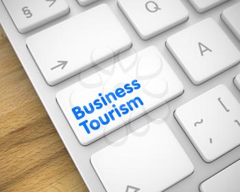Business Concept: Business Tourism on Slim Aluminum Keyboard lying on the Wood Background. A Keyboard with a White Keypad - Business Tourism. 3D Illustration.