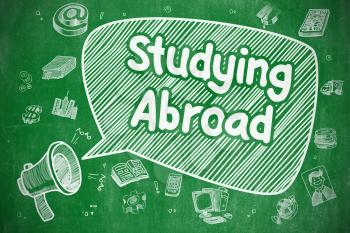 Studying Abroad on Speech Bubble. Doodle Illustration of Yelling Megaphone. Advertising Concept. Business Concept. Loudspeaker with Text Studying Abroad. Doodle Illustration on Green Chalkboard. 