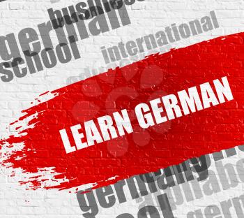 Education Concept: Learn German on the White Wall Background with Wordcloud Around It. Learn German Modern Style Illustration on the Red Distressed Paintbrush Stripe. 