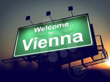 Welcome to Vienna - Green Billboard on the Rising Sun Background.