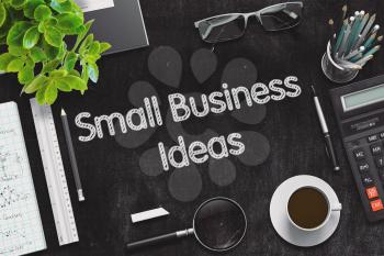Business Concept - Small Business Ideas Handwritten on Black Chalkboard. Top View Composition with Chalkboard and Office Supplies on Office Desk. 3d Rendering. Toned Image.